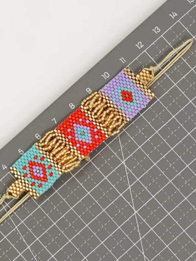 Red geometric braided bracelet