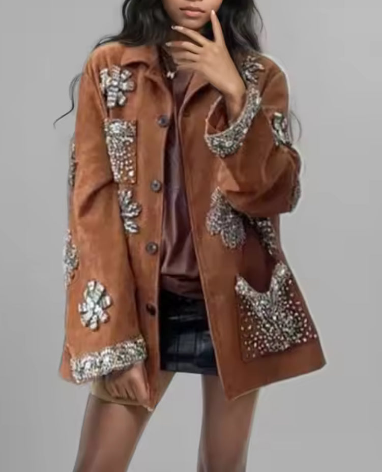 Brown leather jacket with floral details