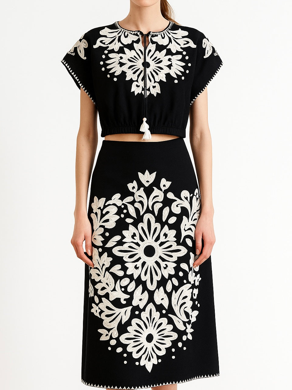 Blue set top and skirt with floral embroidered details