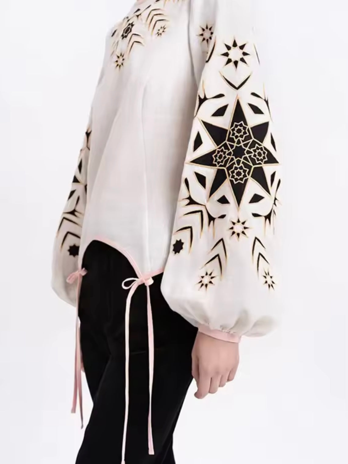 White and black star patched shirt