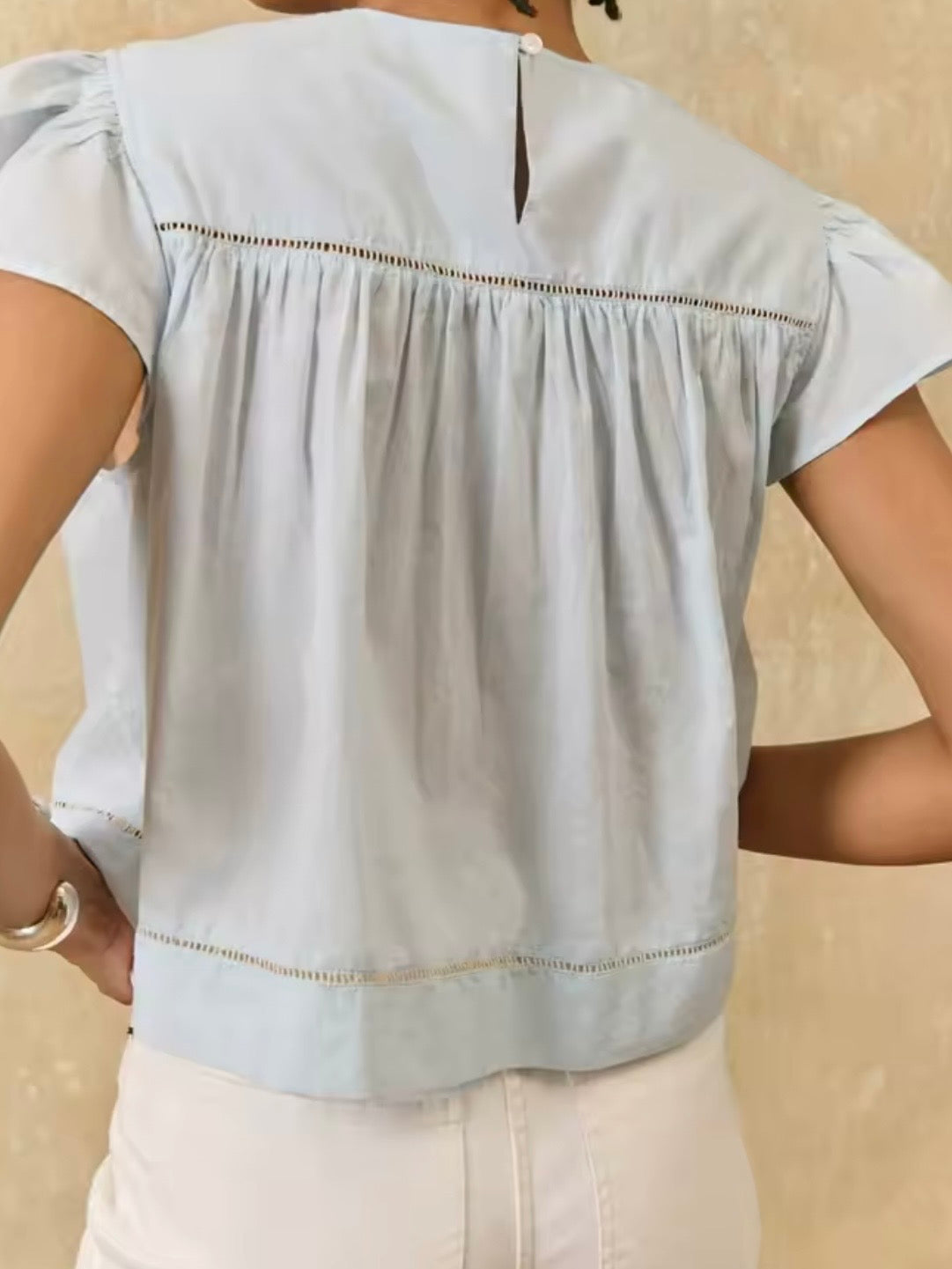 Light blue and beige crochet sleeveless crop top