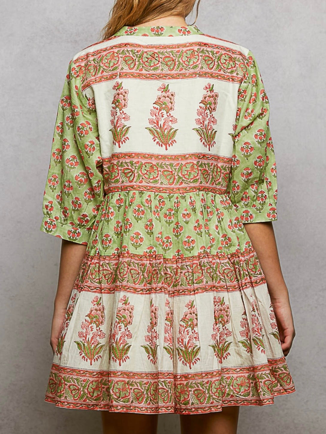 Green and pink long sleeveless mini dress