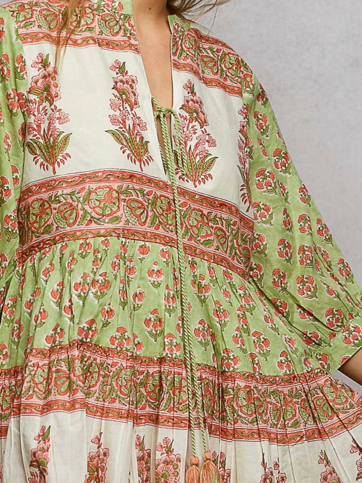 Green and pink long sleeveless mini dress