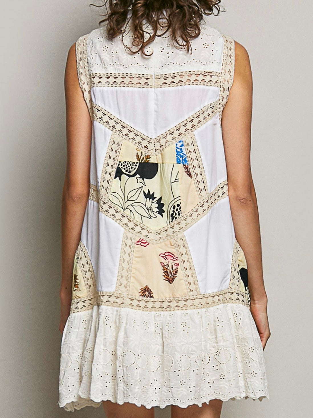 White and crochet sleeveless mini dress