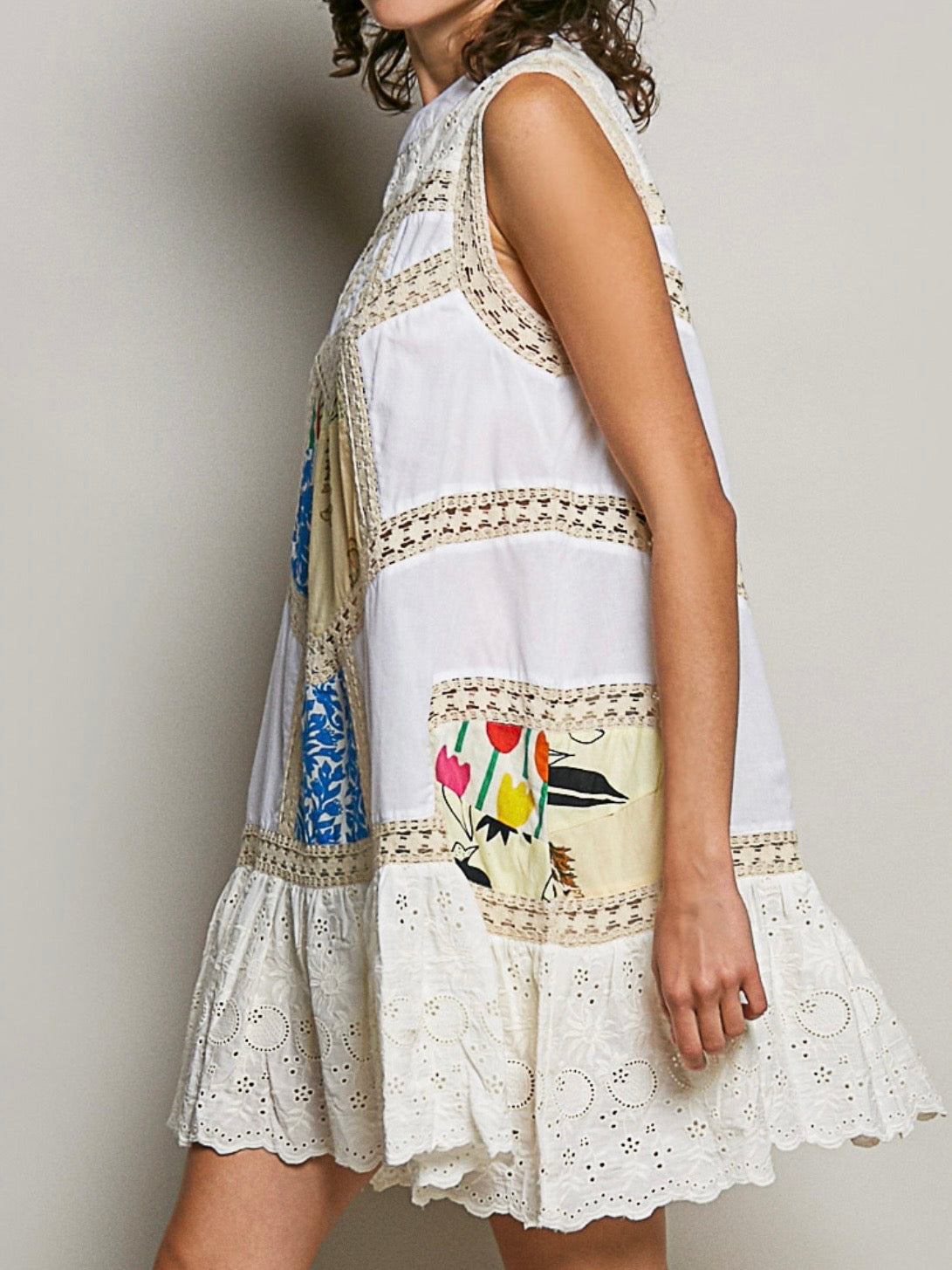 White and crochet sleeveless mini dress