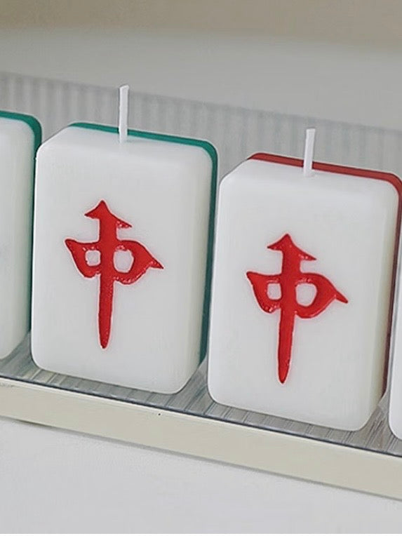 Red and green back mahjong tile Night candle