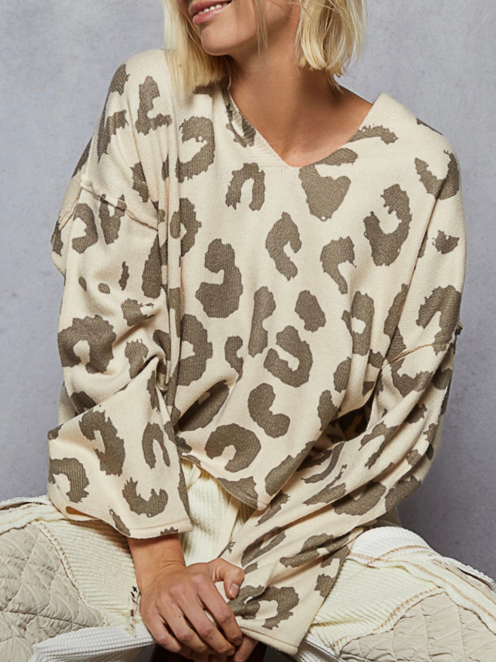 Beige animal print hooded top sweater