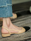 Beige and black flats shoes
