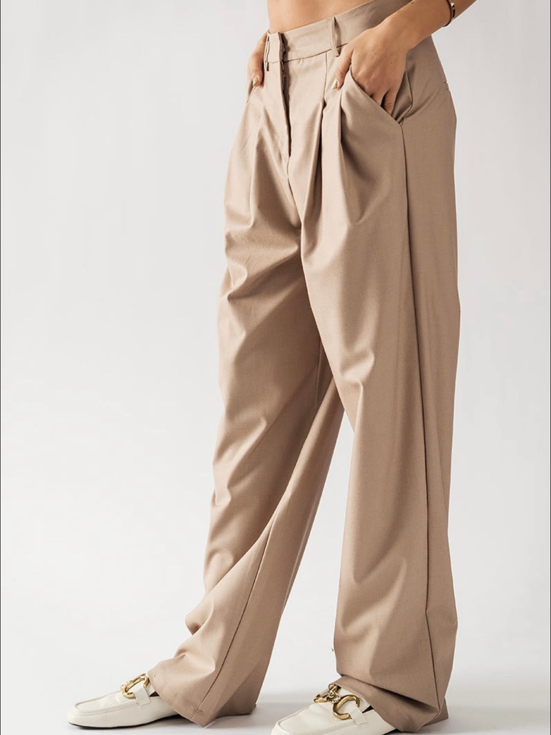Beige pleaded straight leg pants