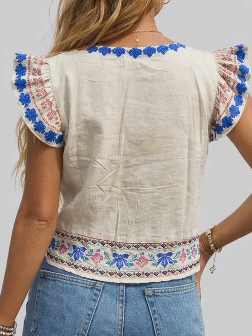 Beige embroidered floral ruffled sleeveless top
