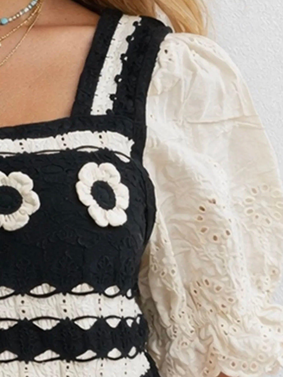 Knitted white and black floral crochet ruffled crop top