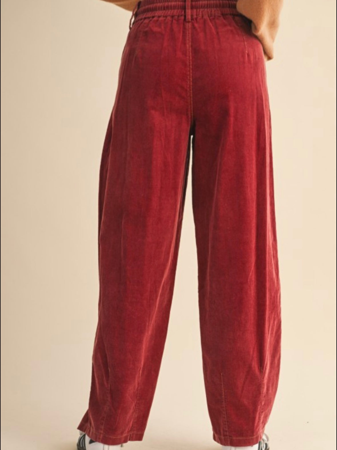 Red washed pleated corduroy barrel pants