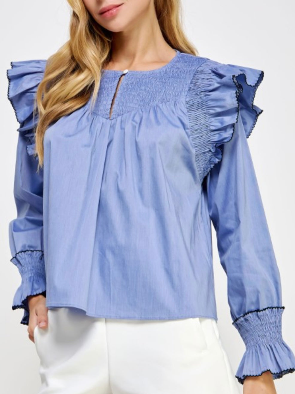 Light blue ruffled shirt