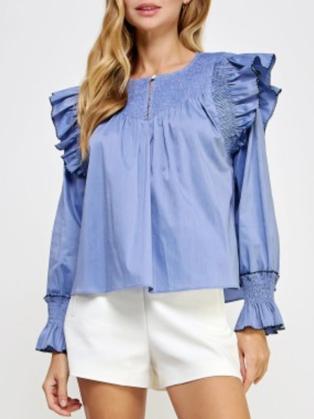 Light blue ruffled shirt