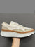 White and beige sneakers stitches shoes
