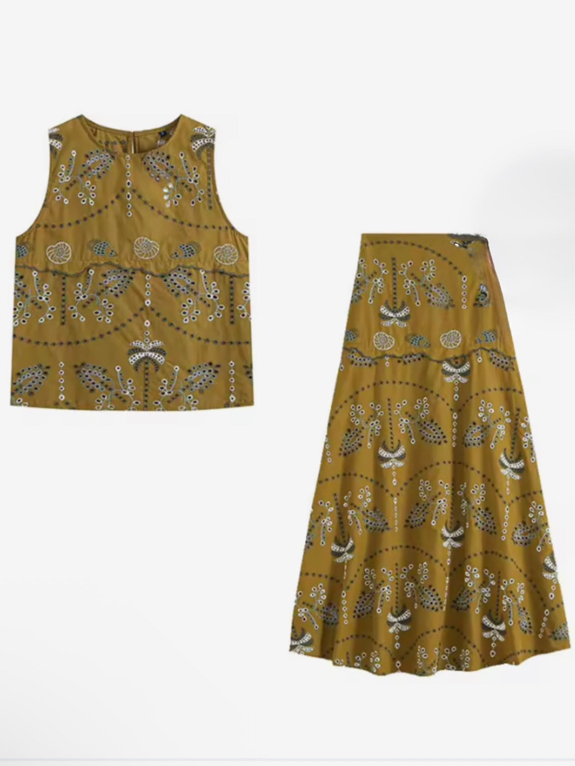 Conjunto de dos piezas de encaje con ojales en color marrón, beige y azul: top y falda midi