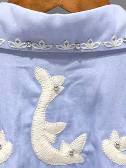 Light blue and white embroidered floral details shirt