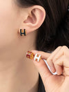 Red round H earrings