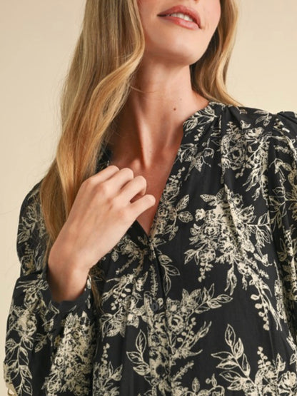 Black and beige floral print shirt