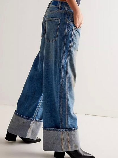 Blue washed and dirty wide jeans pants