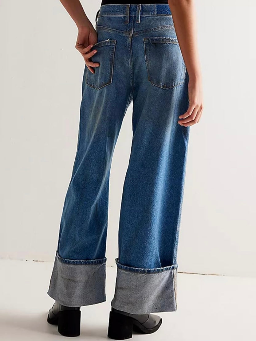 Blue washed and dirty wide jeans pants