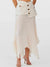 Off white pleaded asymmetrical wide midi skirt