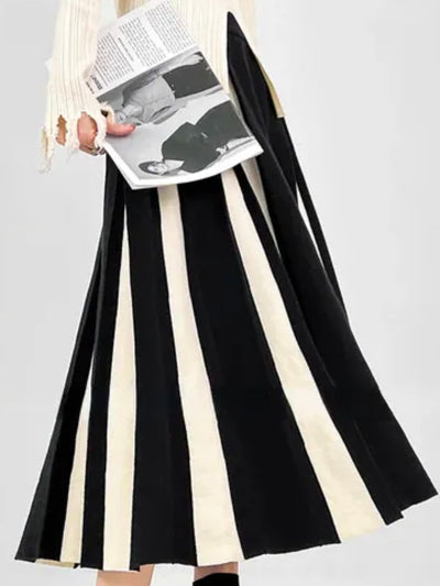BIcolored pleaded black and white wide midi skirt