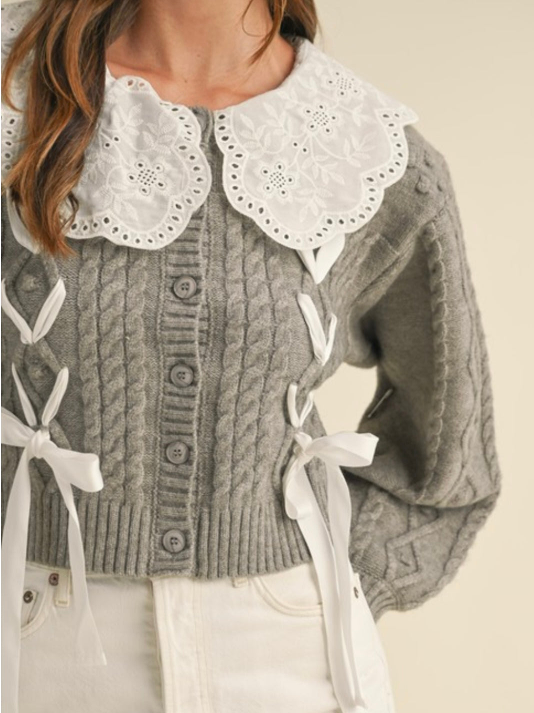 Gray and white knitted sweater