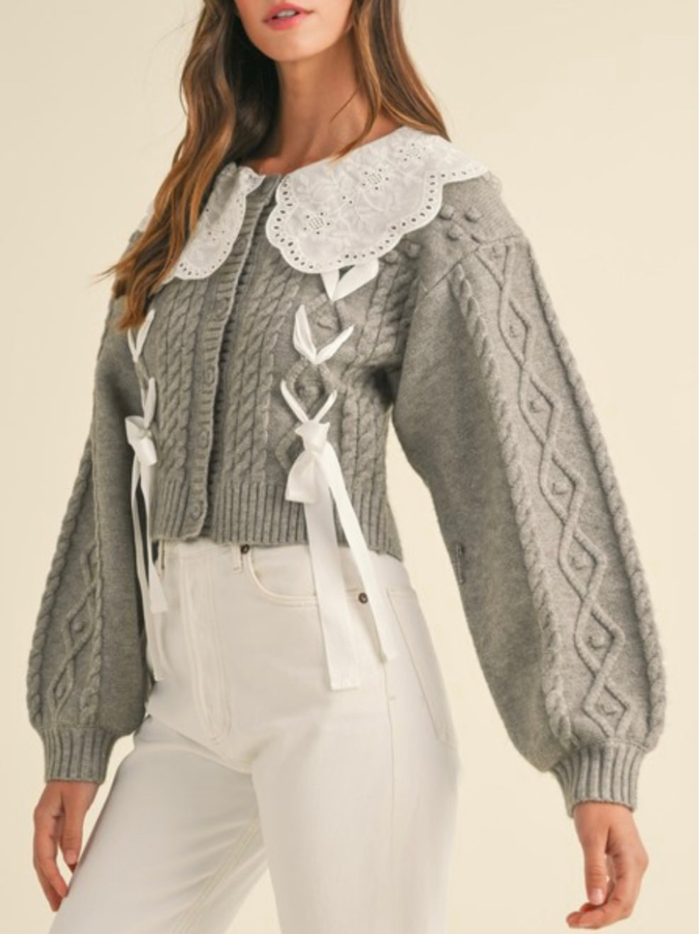 Gray and white knitted sweater