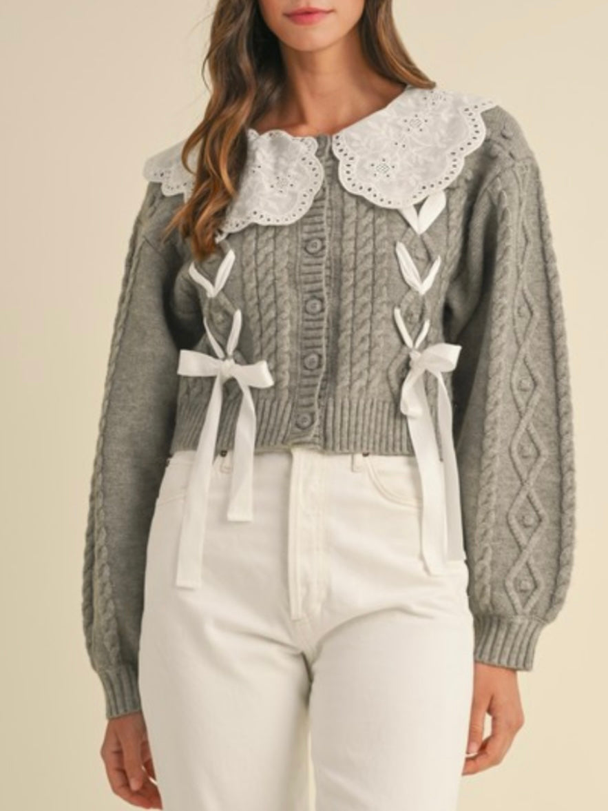 Gray and white knitted sweater