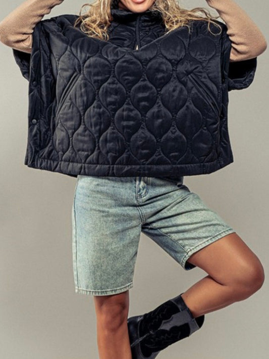 Black quilted oversize vest