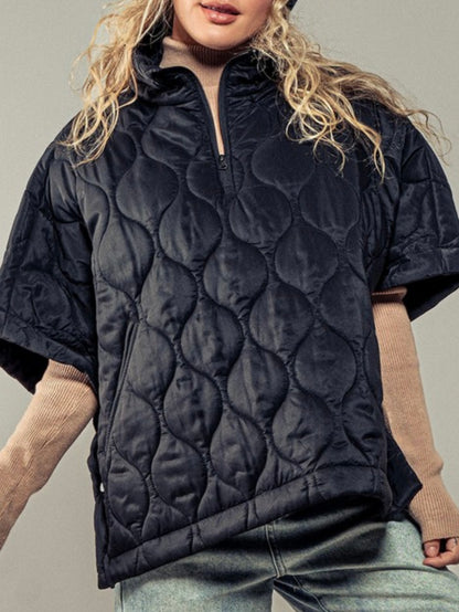 Black quilted oversize vest