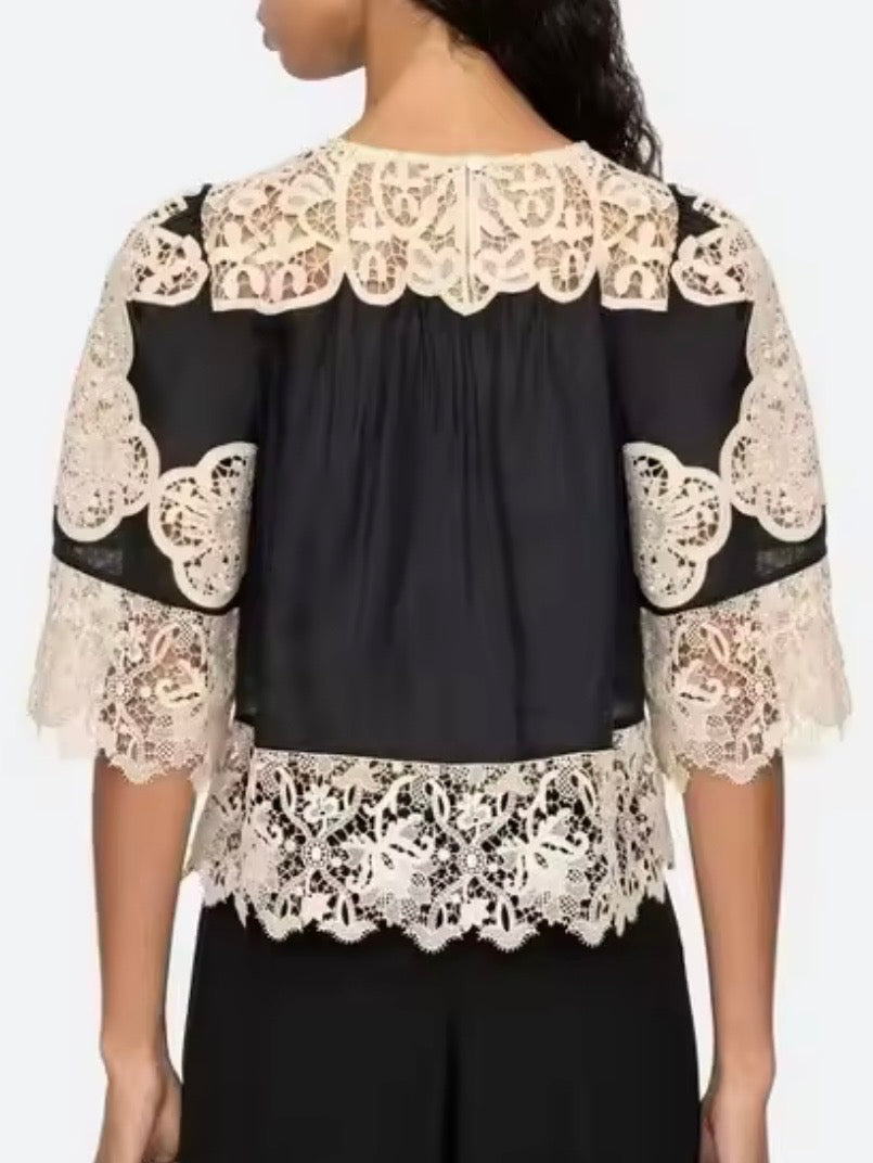 Black and beige lace and ruffled top