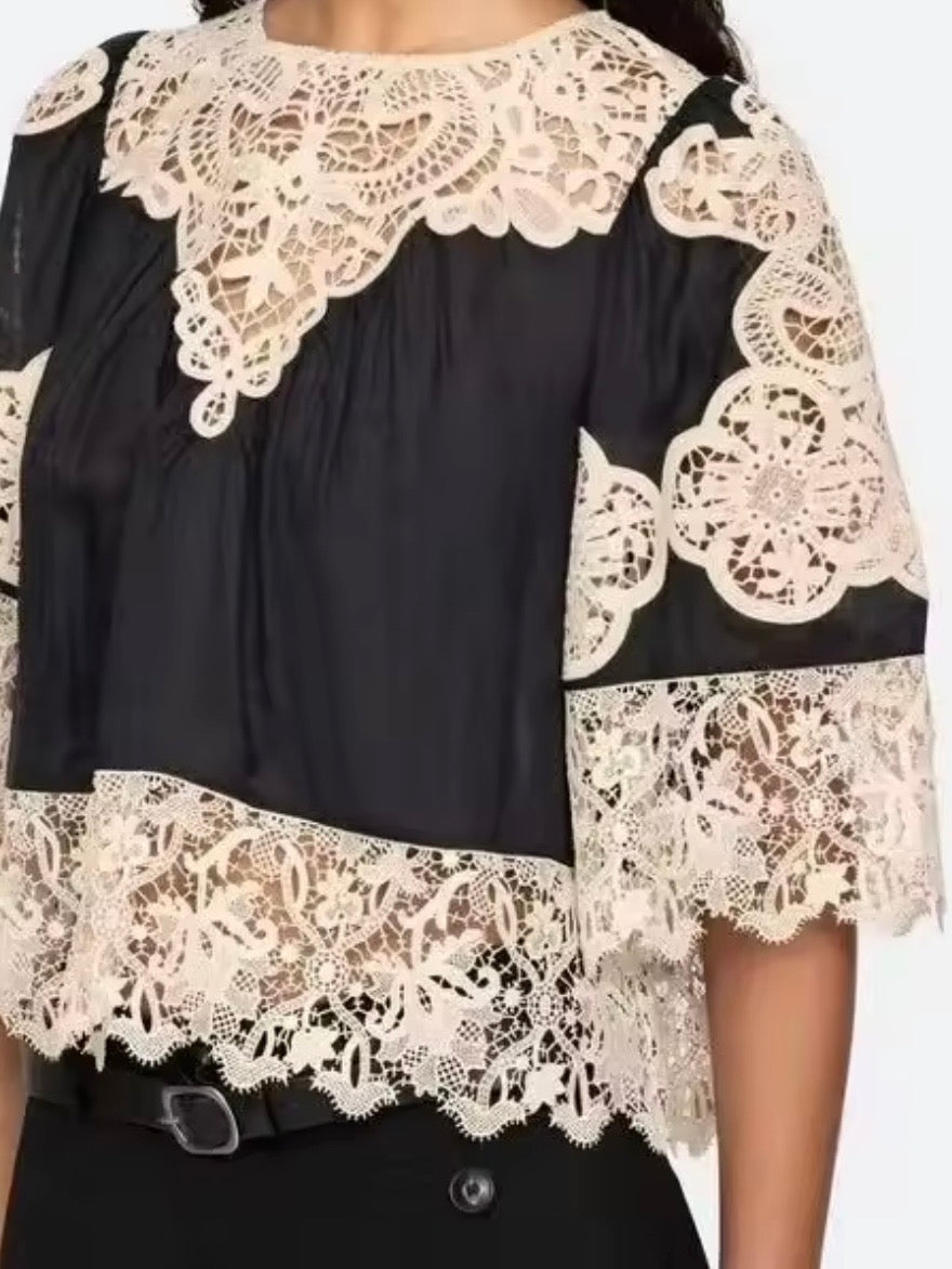 Black and beige lace and ruffled top