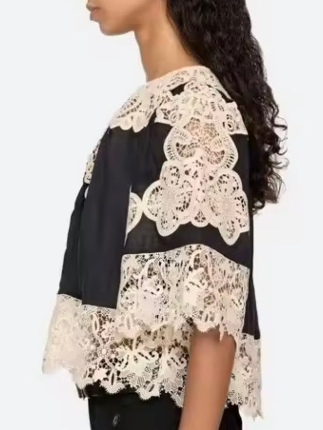 Black and beige lace and ruffled top