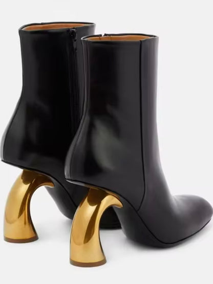 Black faux leather and golden arch high heel boots