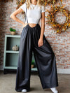Black faux leather loose and flare jumper overall