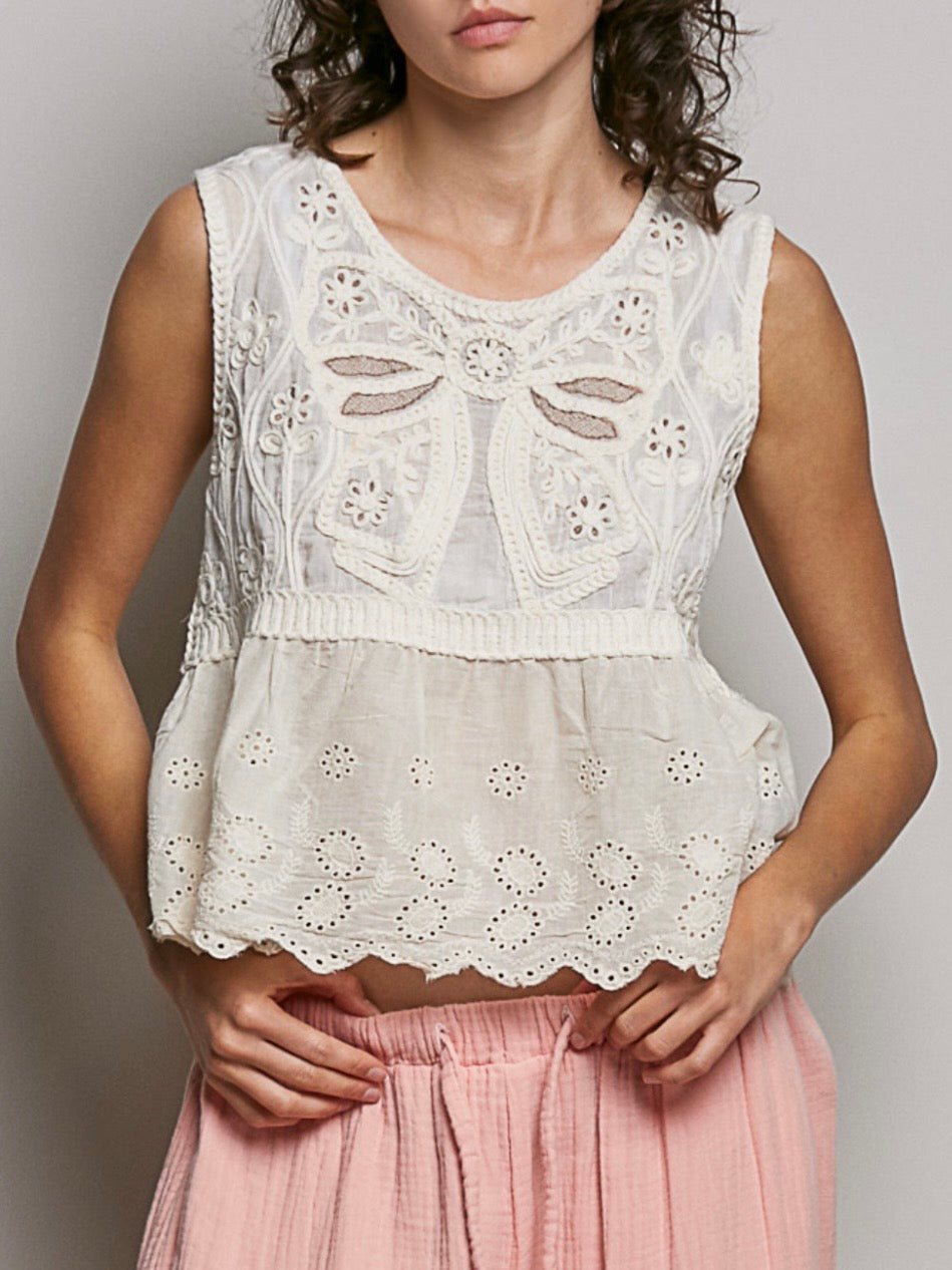 White sleeveless net back loose fit top