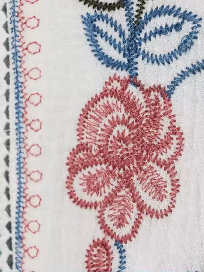 White embroidered red and blue details short sleeves crop top
