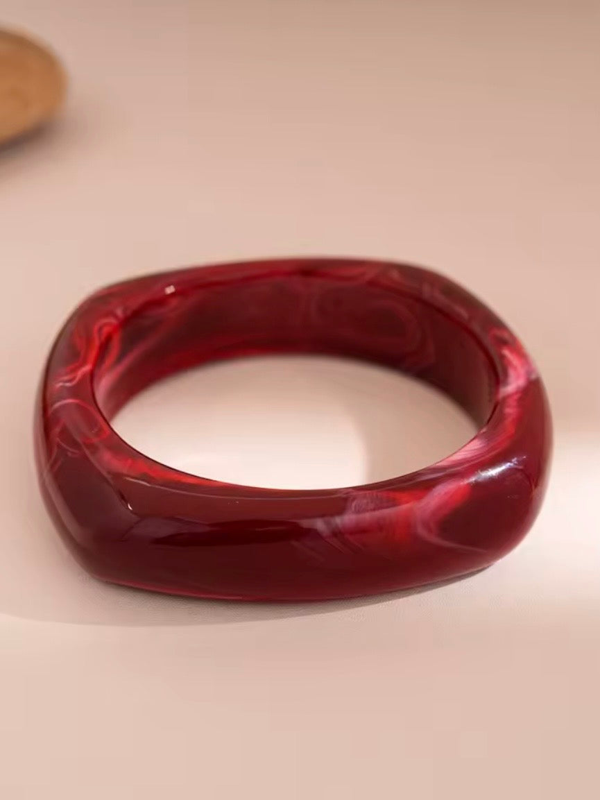 Red mixed designs resin studded brown wide bracelet