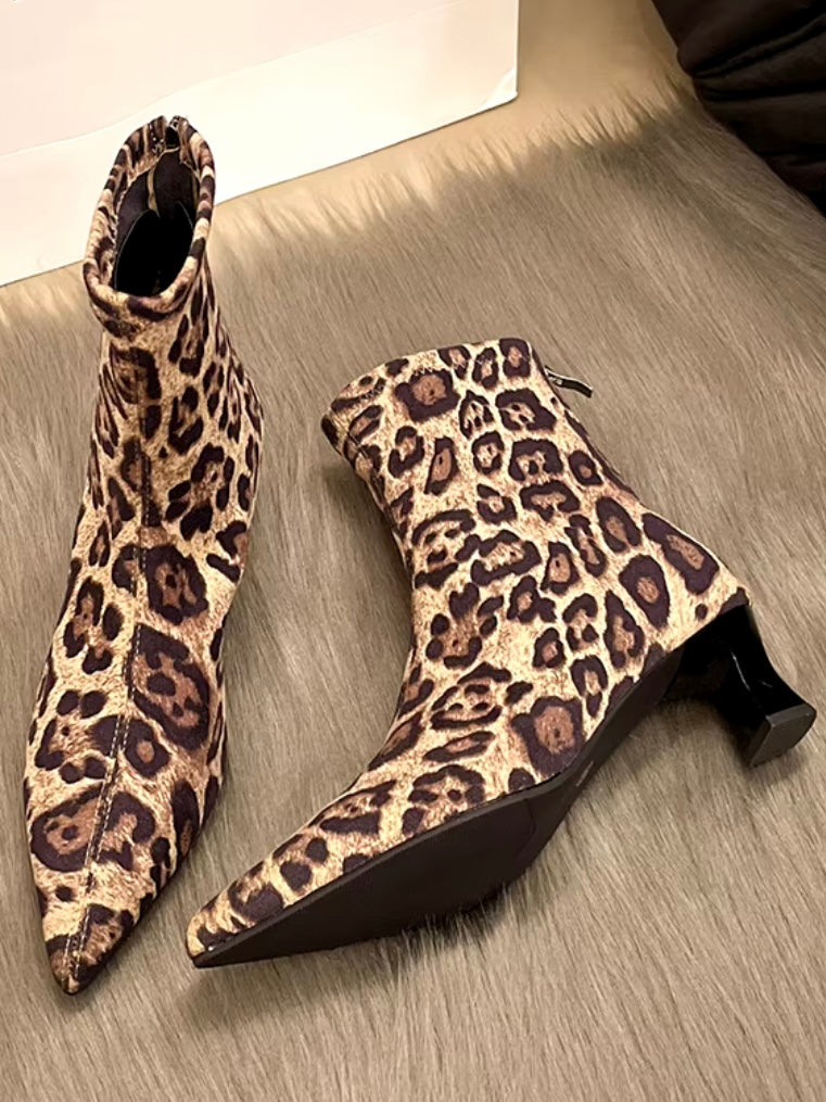 Animal print back zippered mid heel boots