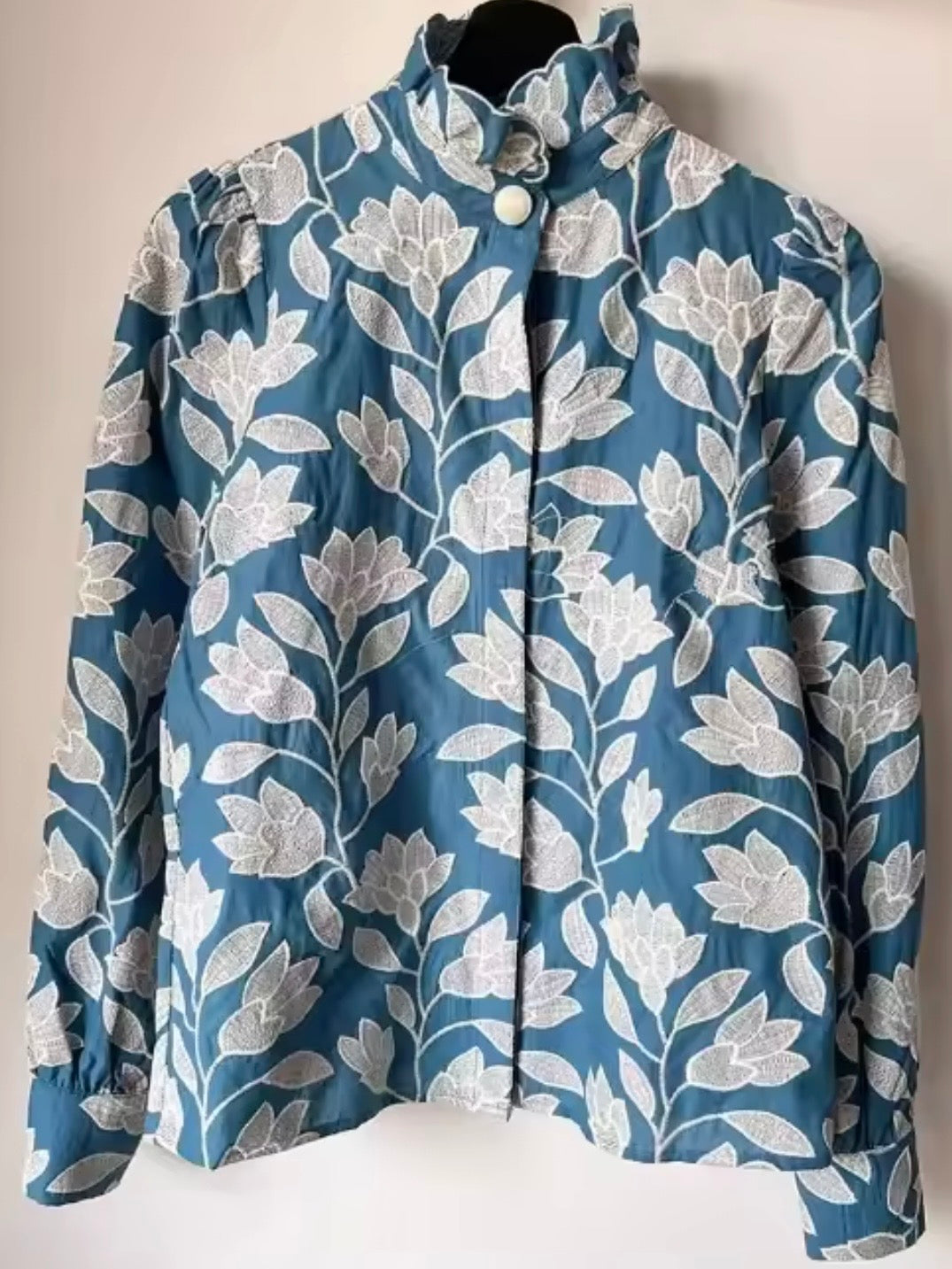 Light blue and white embroidered floral shirt