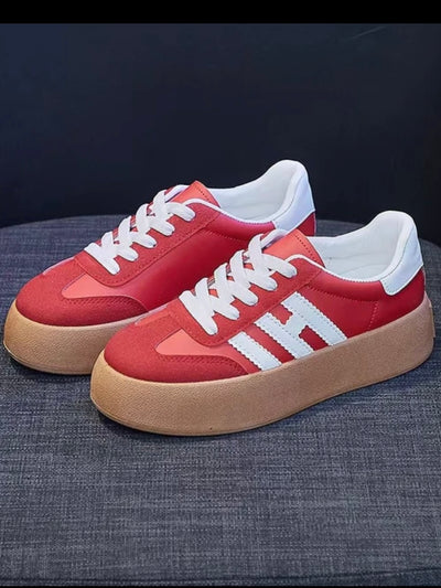 Red and white platform lace up sneakers