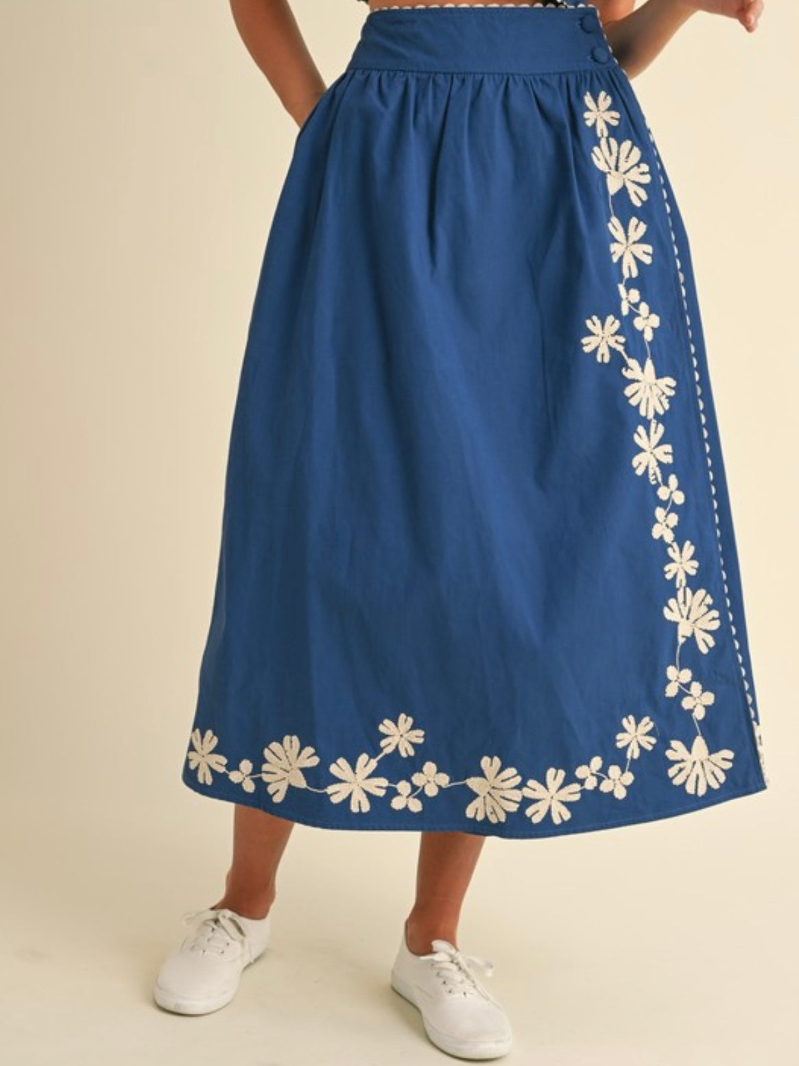 Blue set top and skirt with floral embroidered details