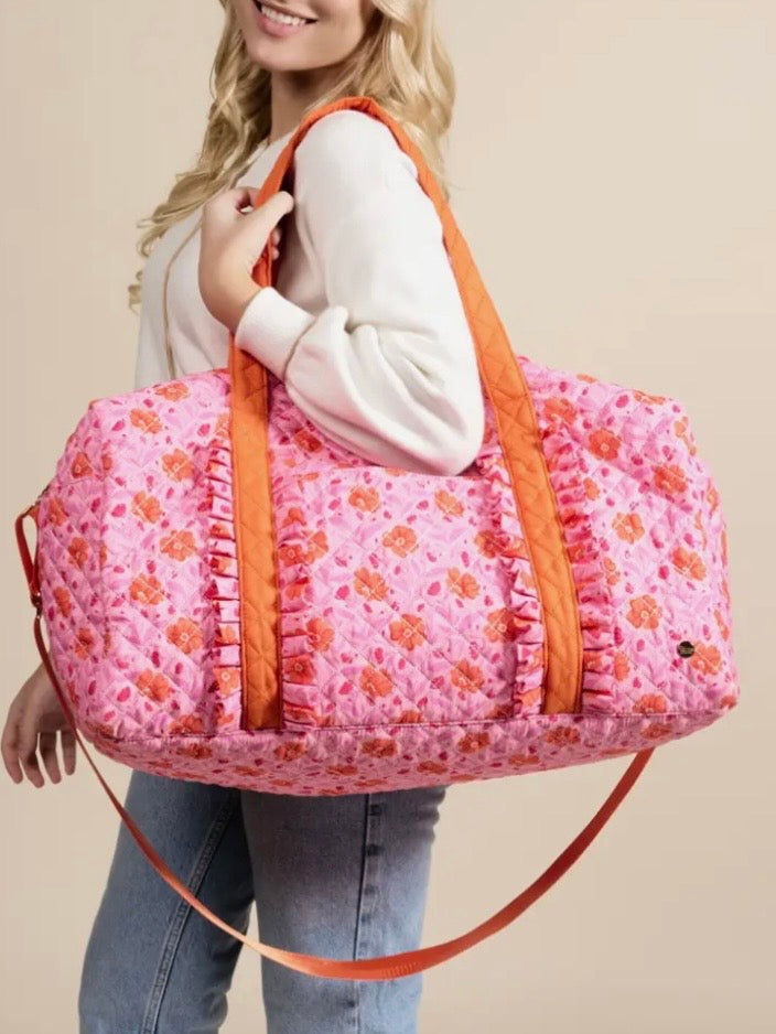 Pink and orange floral quilted handbag