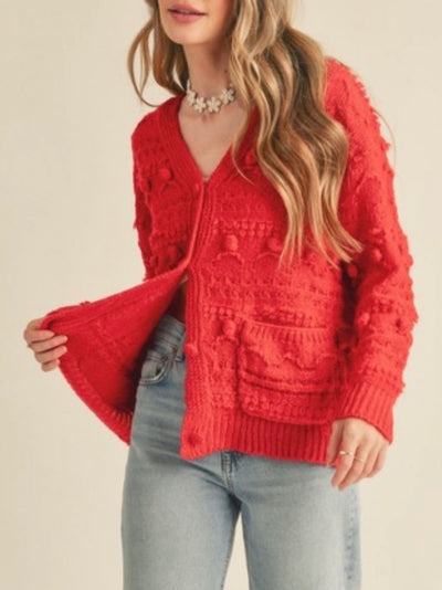 Red open pom-poms cardigan sweater