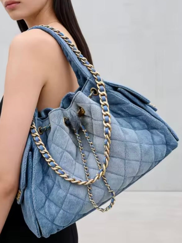 Denim light blue quilted handbag