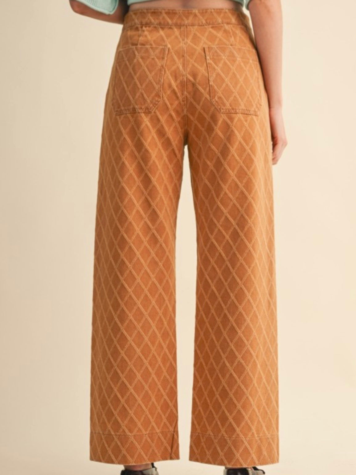 Orange diamonds seams pattern fabric pants