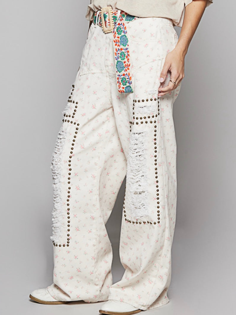 Beige floral print distressed studded pants