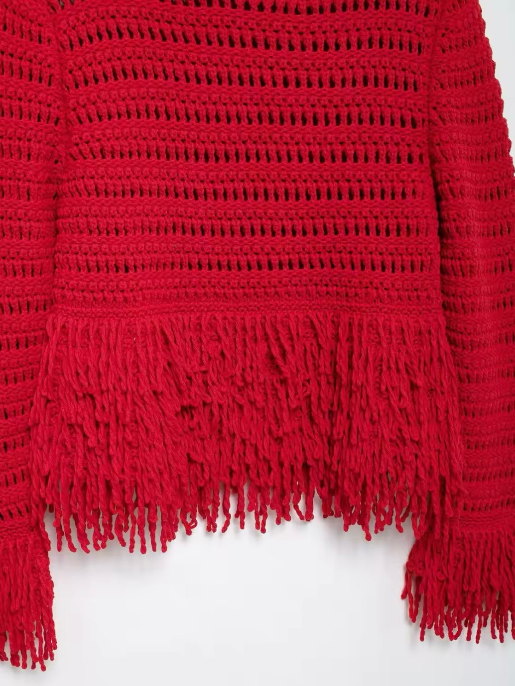 Red embroidered fringes edge sweater